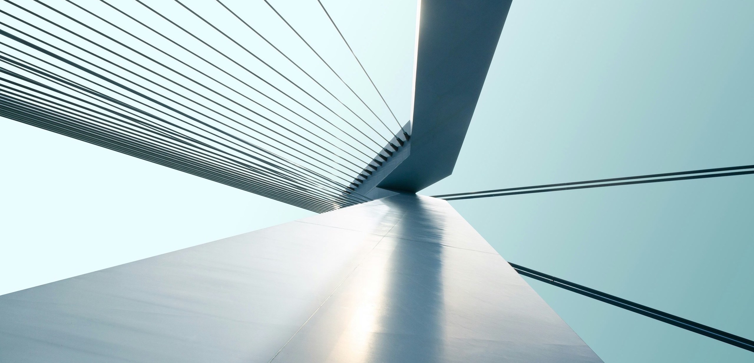 Suspension bridge symbolizing financial structuring, financial advisory and project